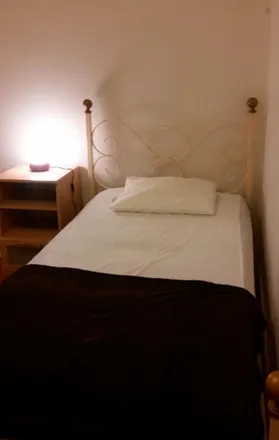 Rent this 4 bed room on Estrada de A-da-Maia in 1500-004 Lisbon, Portugal