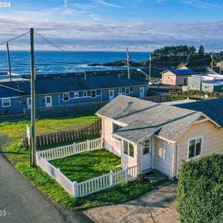 Buy this 2 bed house on Joan-E Unique Gifts in 10 East Collins Street, Depoe Bay
