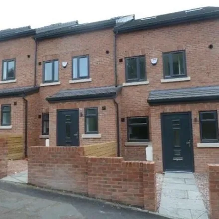 Rent this 3 bed townhouse on Cumbria Court in Rainsough, Prestwich