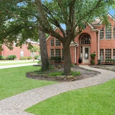 Rent this 4 bed house on 49 Berry Blossom Drive in Grogan's Mill, The Woodlands