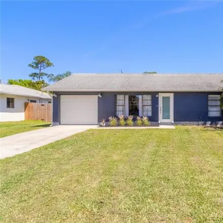 Buy this 3 bed house on 2517 Milton Avenue in New Smyrna Beach, FL 32168
