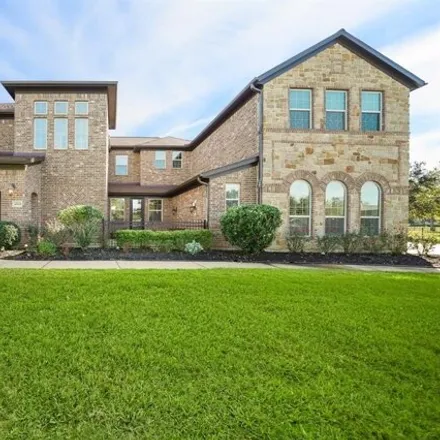 Rent this 5 bed house on 32681 Windsor Terrace in Weston Lakes, TX 77441