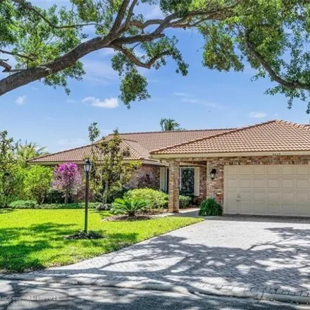 Buy this 4 bed house on 9024 Northwest 53rd Manor in Ridgeview, Coral Springs