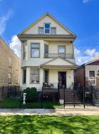 Buy this 6 bed house on 3329 West Belle Plaine Avenue in Chicago, IL 60618