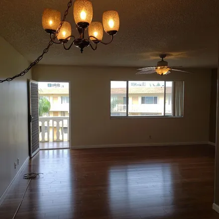 Rent this 1 bed apartment on 200 Village Green Circle East in Palm Springs, FL 33461