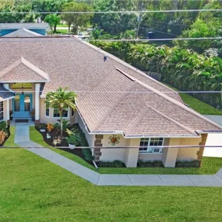 Buy this 4 bed house on 6815 Idlewild Street in Lee County, FL 33966