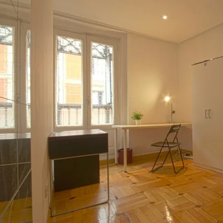Rent this 6 bed room on Madrid in Vitaldent, Calle de Atocha