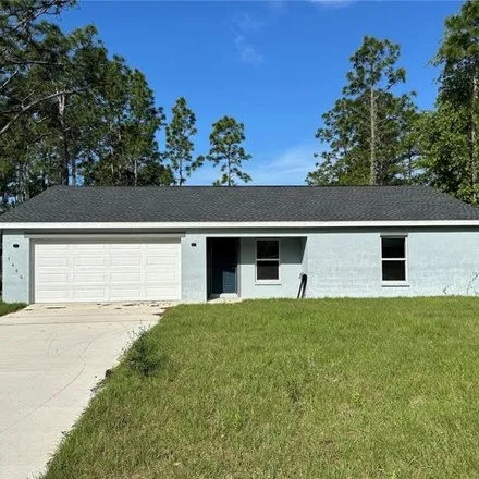 Rent this 3 bed house on 7526 North Galena Avenue in Citrus Springs, FL 34434
