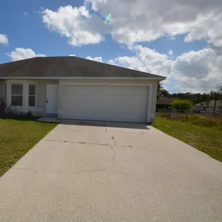 Rent this 3 bed house on 1524 Reed Street Northwest in Palm Bay, FL 32907