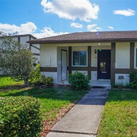 Buy this 2 bed house on 2880 Grovewood Blvd in Palm Harbor, Florida