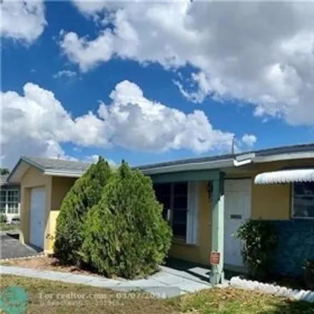 Rent this 3 bed house on 1600 Northwest 43rd Street in Twin Lakes, Broward County