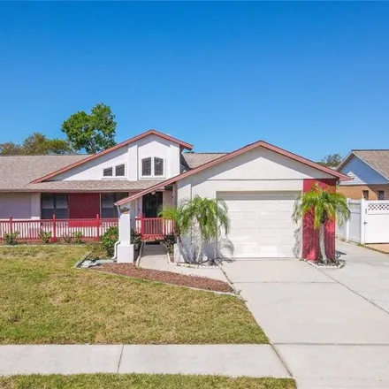 Buy this 3 bed house on 2707 Tung Drive in Holiday, FL 34691