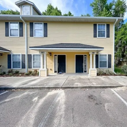 Rent this 2 bed townhouse on unnamed road in Gainesville, FL 32612