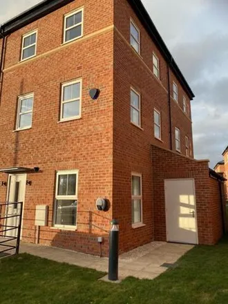 Rent this 2 bed townhouse on Moyes Centre in Roche Avenue, Leeds