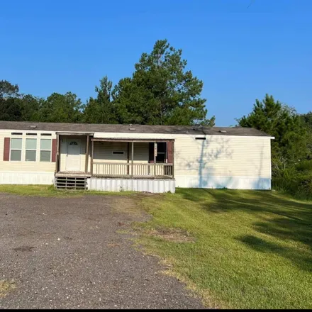 Rent this 3 bed house on 7879 Hickory Hollow Drive in Hardin County, TX 77657