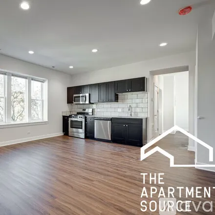 Rent this 3 bed apartment on 3135 W Montrose Ave