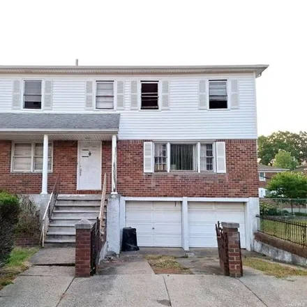 Buy this 4 bed house on 56-05 Oceania St in Oakland Gardens, New York