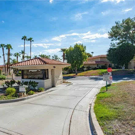 Buy this 2 bed townhouse on 73237 Rod Laver Lane in Palm Desert, CA 92260