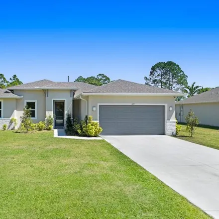 Buy this 4 bed house on 485 Cheltenham Avenue Southeast in Palm Bay, FL 32909