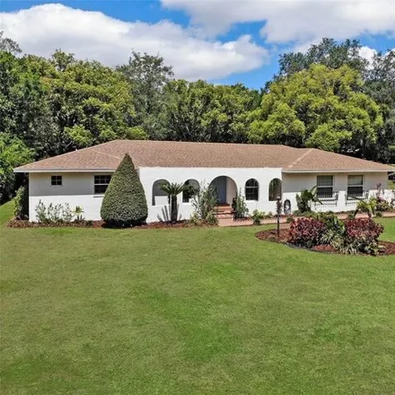 Buy this 4 bed house on 5266 Upland Place in Polk County, FL 33813