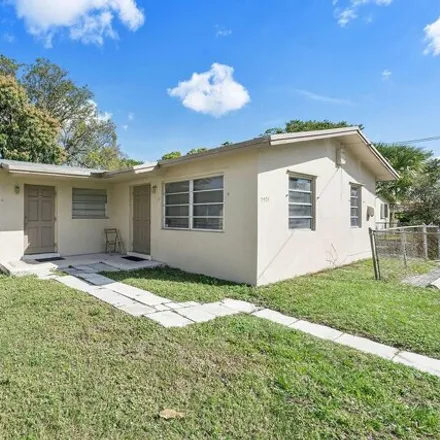 Buy this 4 bed house on 2883 Northwest 11th Street in Washington Park, Broward County