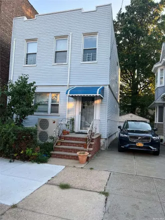 Buy this 3 bed house on 72-24 73rd Street in New York, NY 11385