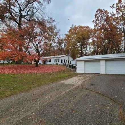 Buy this 2 bed house on West Unora Park Drive in Webber Township, MI 49304