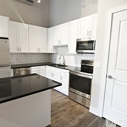 Rent this 3 bed apartment on 3833 N Broadway