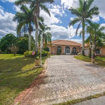 Buy this 5 bed house on 2701 Southeast Kern Road in Port Saint Lucie, FL 34984