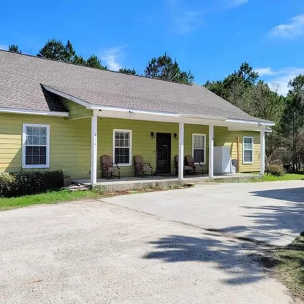 Buy this 4 bed house on 906 Old Spanish Trail in Waveland, MS 39576