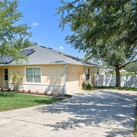 Buy this 4 bed house on 2829 Grassmoor Loop in Apopka, Florida