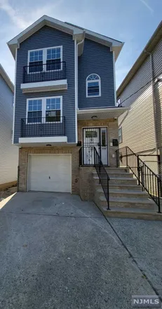 Buy this 5 bed townhouse on 172 12th Avenue in Paterson, NJ 07501