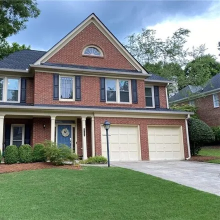 Buy this 4 bed house on 4759 Woodland Brook Court Southeast in Cobb County, GA 30339