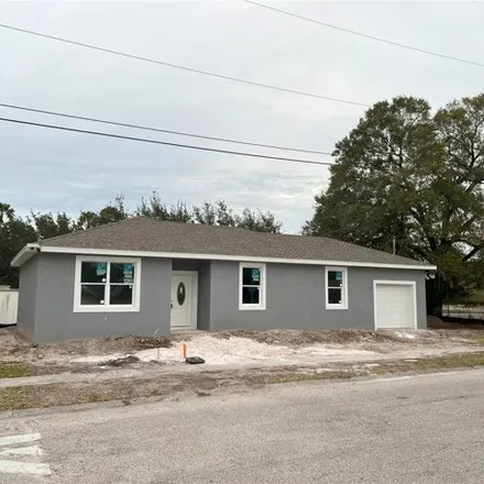 Buy this 4 bed house on 7311 Kingsbury Circle in Tampa, FL 33610