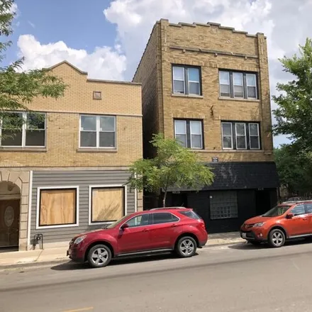Rent this 2 bed house on 4874 West Armitage Avenue in Chicago, IL 60639