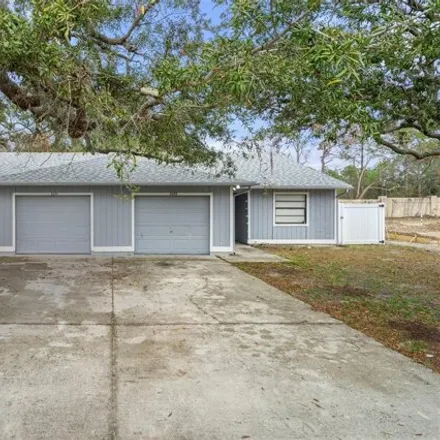 Buy this 4 bed house on 8051 Canterbury Street in Spring Hill, FL 34606