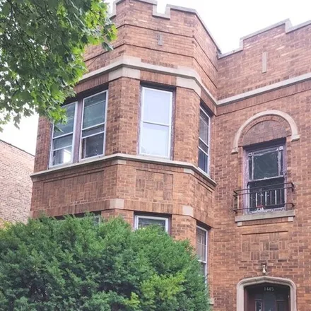 Buy this 6 bed house on 1445 East 76th Street in Chicago, IL 60649