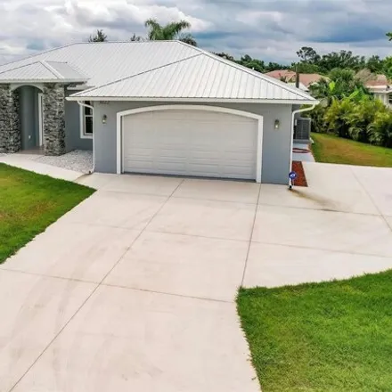 Buy this 3 bed house on 3012 Conway Boulevard in Port Charlotte, FL 33952