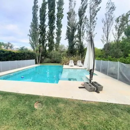 Buy this 4 bed house on unnamed road in Partido de Luján, 6700 Luján