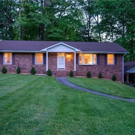 Buy this 3 bed house on 6190 Hollow Wood Court in Winston-Salem, NC 27104