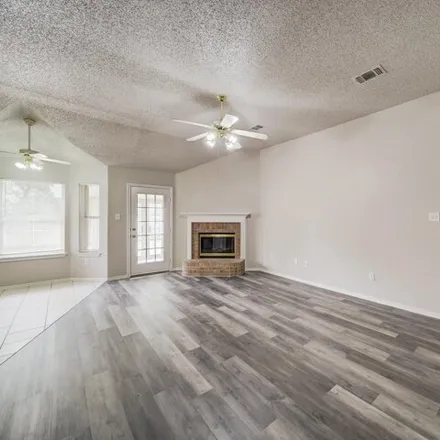Rent this 3 bed house on 1704 Cedar Tree Drive in Fort Worth, TX 76131