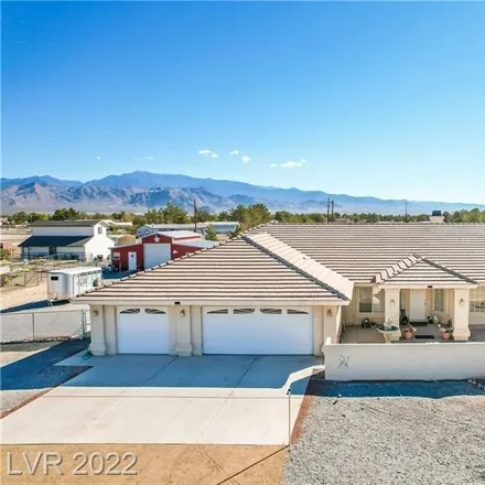 Buy this 4 bed house on 3941 Unicorn Avenue in Pahrump, NV 89048