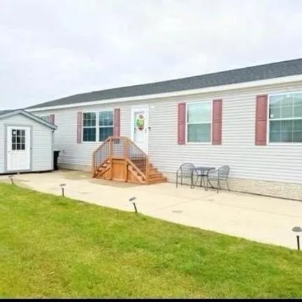 Buy this studio apartment on 45433 Burgundy Drive in Macomb Township, MI 48044