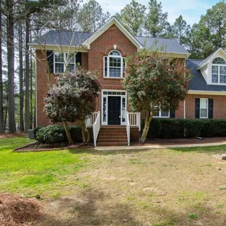 Buy this 4 bed house on 1921 Wheelerbrook Court in Wake County, NC 27603