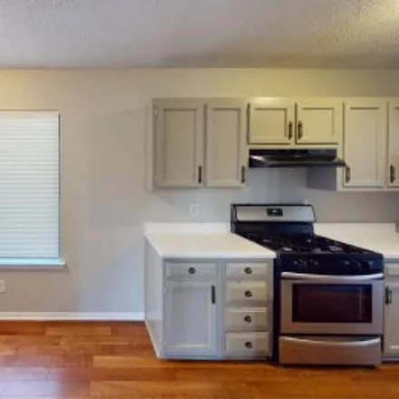 Rent this 4 bed apartment on 9767 Greenside Way in Knollwood Village, Douglasville