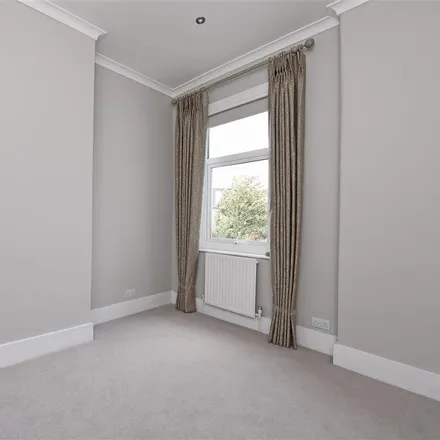 Image 7 - 25 Durnsford Avenue, London, SW19 8BH, United Kingdom - Townhouse for rent