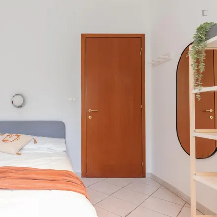 Rent this 3 bed room on Via Rodolfo Carabelli in 2, 20137 Milan MI