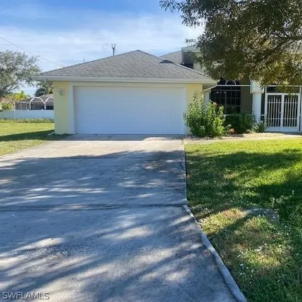 Rent this 3 bed house on 3409 Southwest 25th Place in Cape Coral, FL 33914