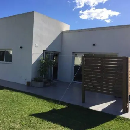 Buy this 3 bed house on Calle 19 in Bosque de Peralta Ramos, B7603 DRT Mar del Plata