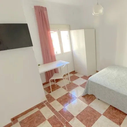 Rent this 4 bed room on Calle Doctor González Meneses in 41009 Seville, Spain